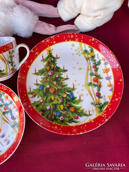 A beautiful trio of porcelain tea sets with a Christmas pattern