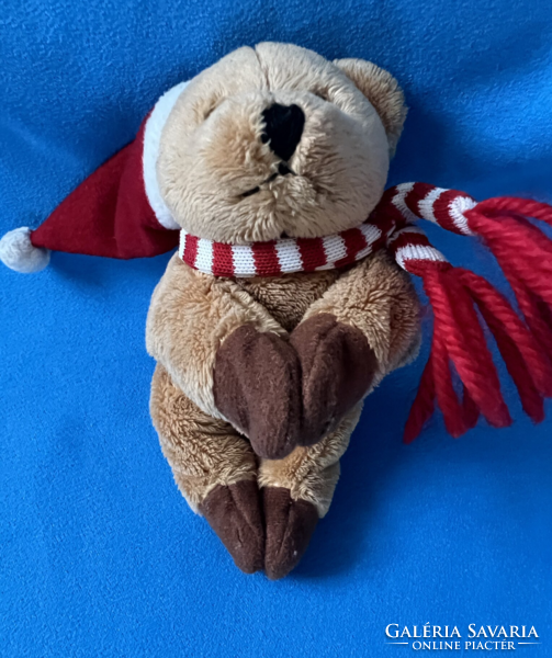Santa Claus hat with plush teddy bear scarf