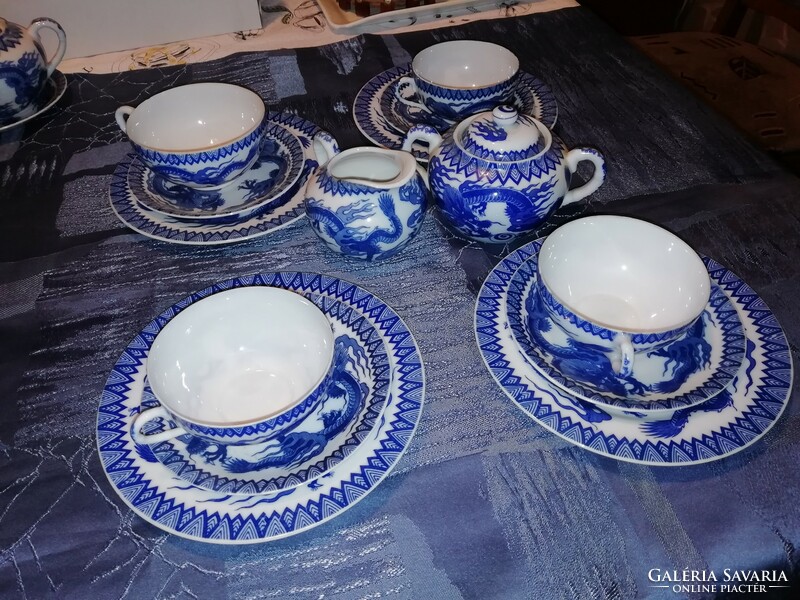 Pieces of a Japanese blue dragon eggshell porcelain tea set