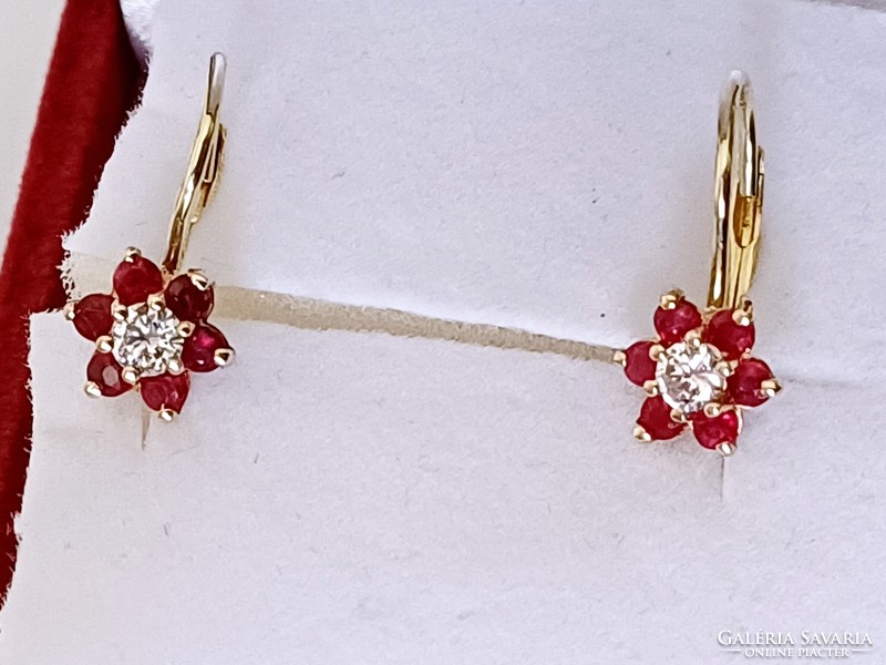 Tiny gold earrings with brils and rubies