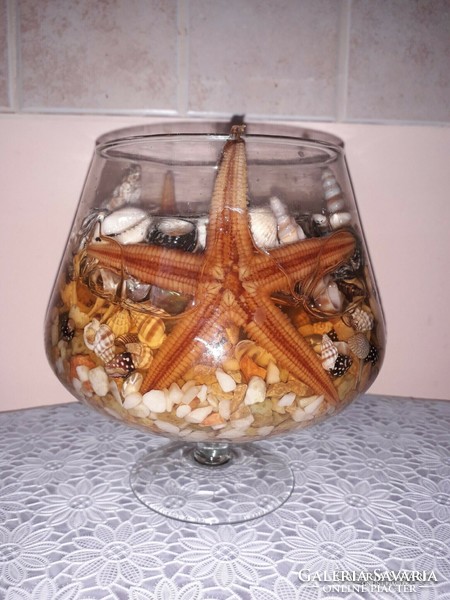 Glass candlestick with shells