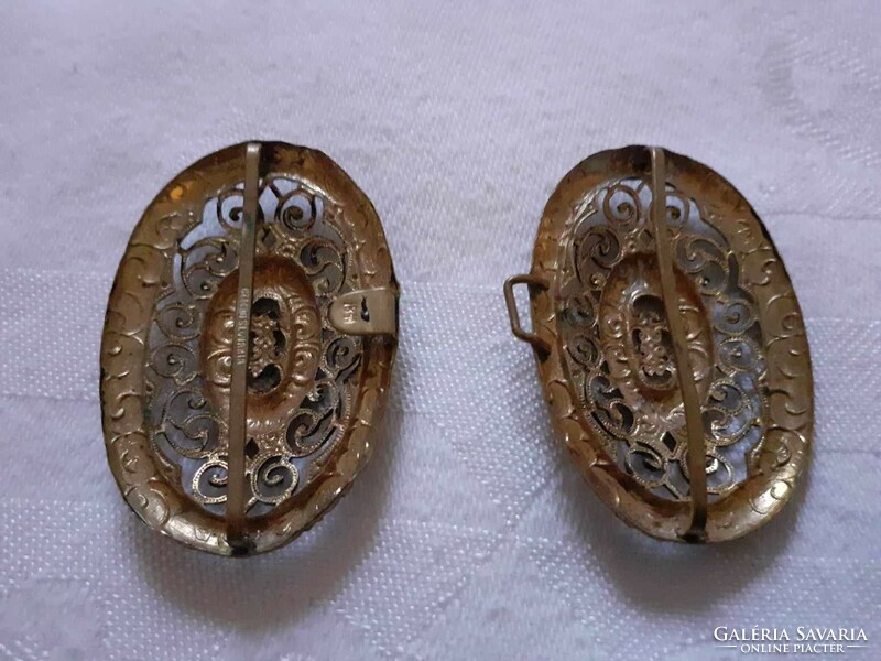 A pair of very nice, old chiseled (perhaps copper) belt buckles