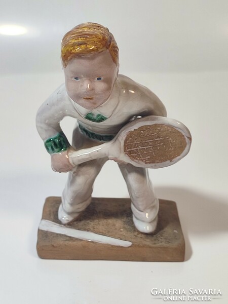 Ceramic figurine of Izsèpy playing tennis