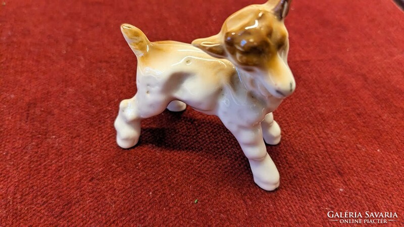 Porcelain figurine of a goat