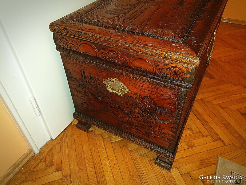 Large scene carved wooden chest