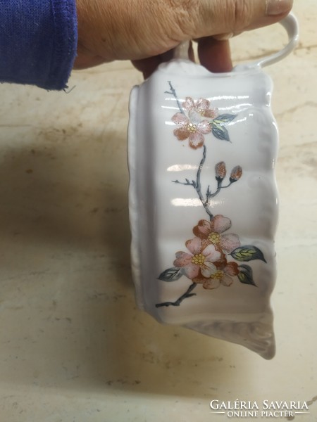 Porcelain peach blossom sauce pourer. Good seller!