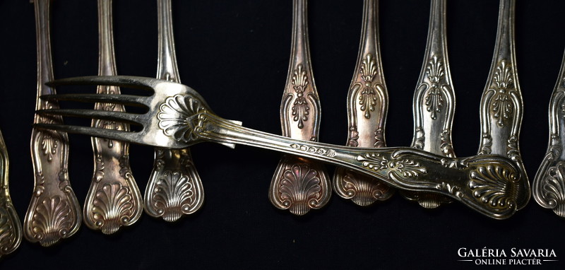 12 thickly silver-plated marked neo-baroque style forks!