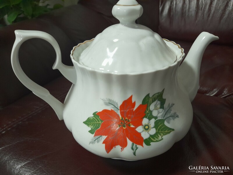 Teapot with poinsettia pattern
