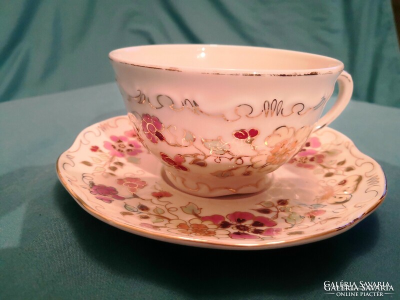 Zsolnay butterfly pattern tea cup, the gilding on the mouth is worn in some places