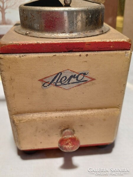 Old grinder with aero inscription