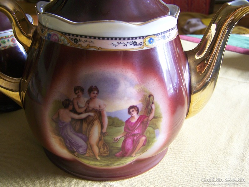 A hinged, old porcelain tea set