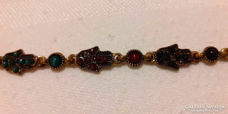 Charm bracelet with Arabic symbol (hand of Fatima)