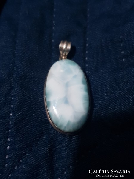 A real larimar pendant with a beautiful pattern encased in 925 silver