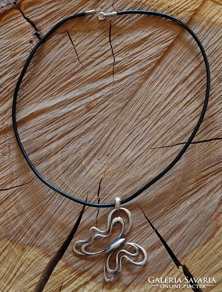 Special silver butterfly pendant on a rubber chain