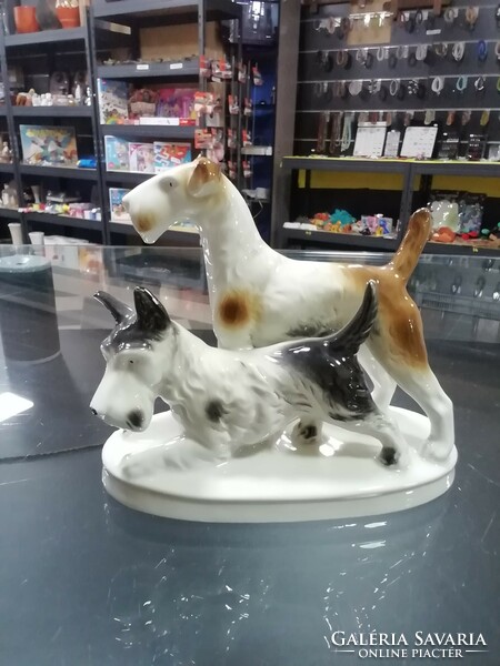 Pair of GDR porcelain foxes