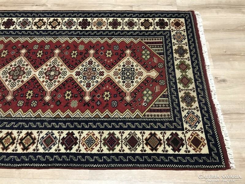 Old hand-knotted wool Persian rug from Békésszentandra, 102 x 205 cm