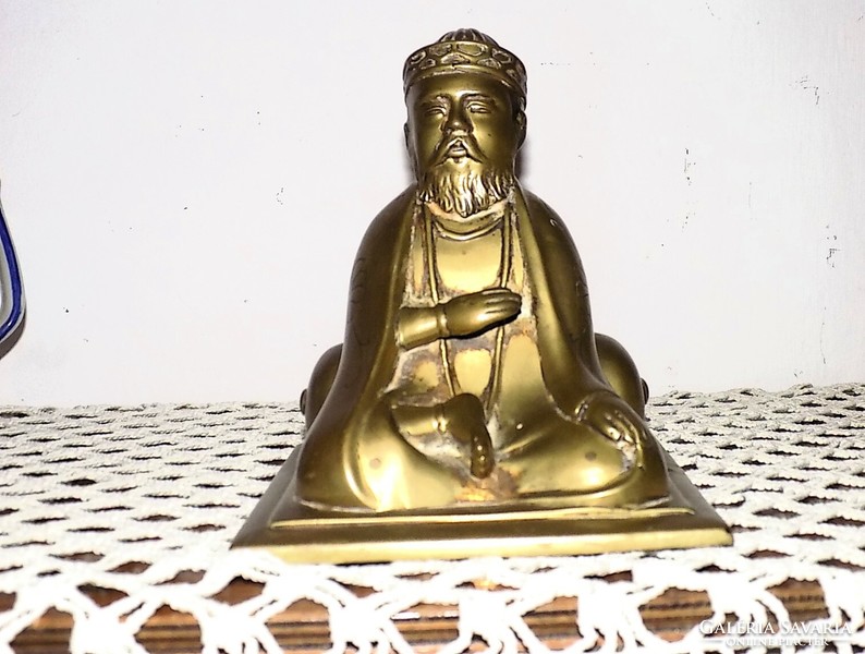 Patinated Buddhist bronze statue