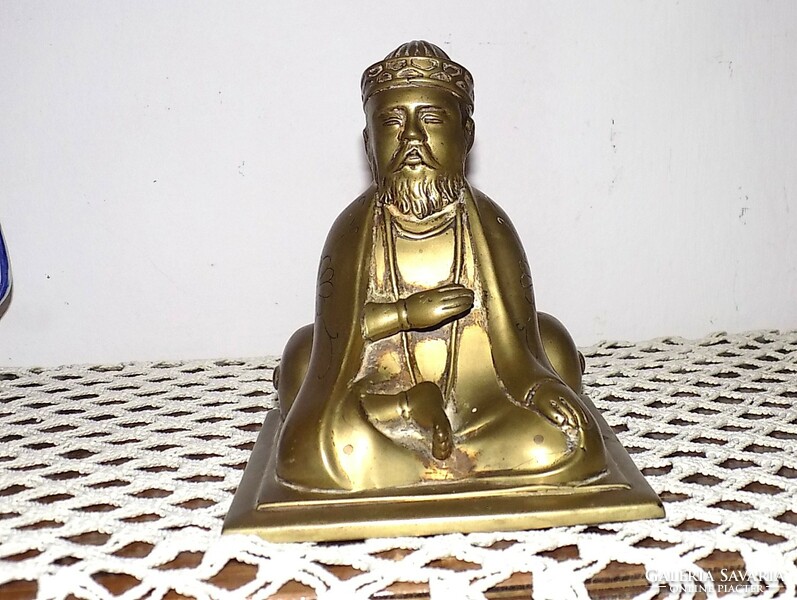 Patinated Buddhist bronze statue