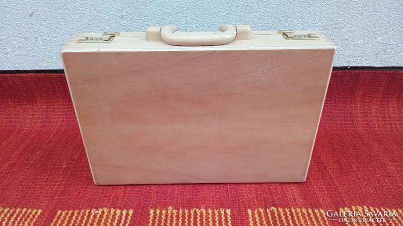 Vintage amiet wood briefcase with 3-digit code and pockets. Negotiable!