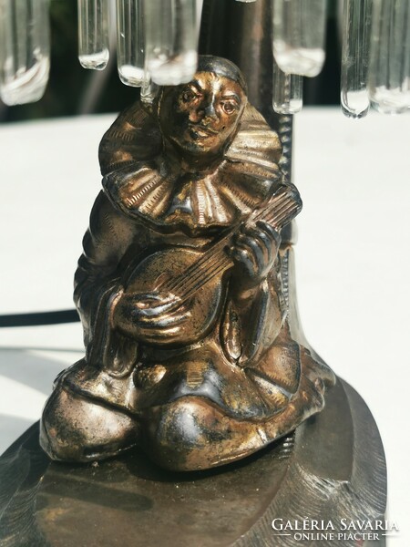 Antique copper lamp with clown