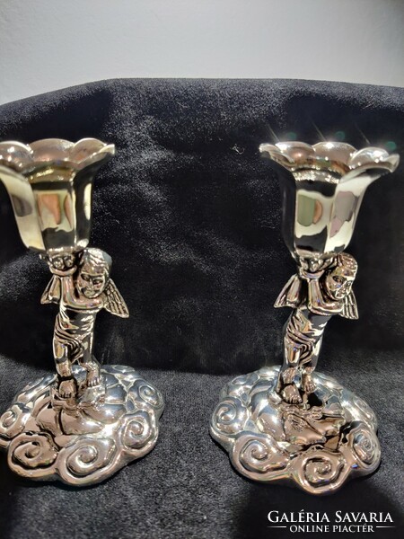 Pair of angelic metal candle holders