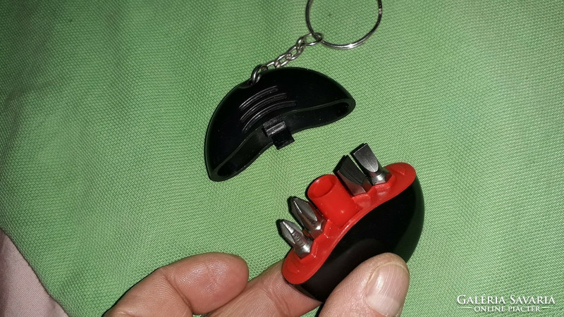 Old plastic car key holder with a practical screwdriver set is rare according to the pictures