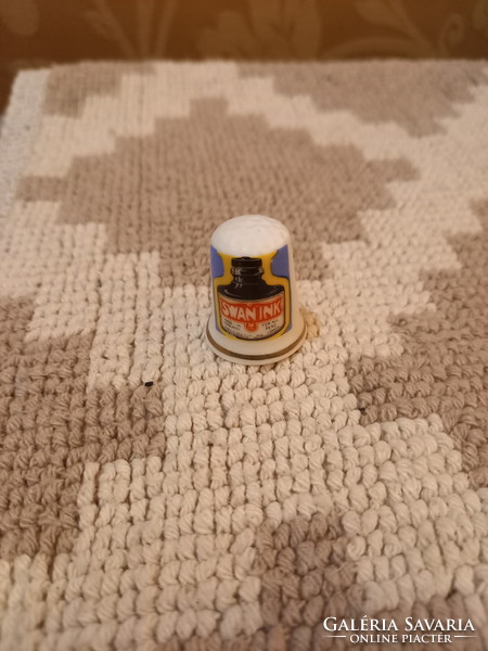 Nice old porcelain thimble with swan ink advertisement
