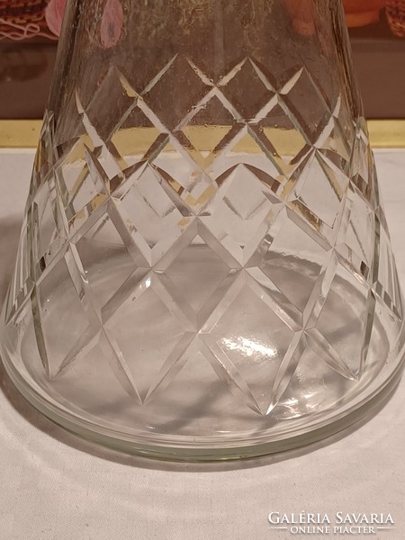 Old engraved crystal liqueur glass with a well-closing stopper