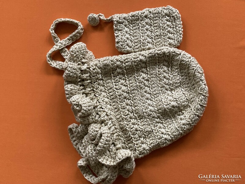 Crocheted bag with phone holder.