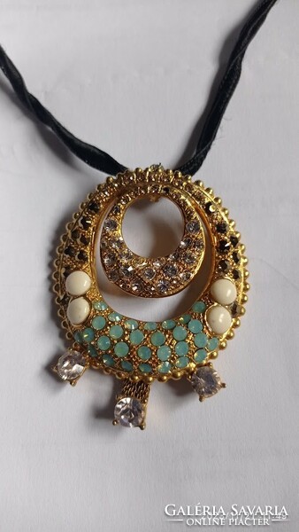 Women's chain, necklace with striking, rhinestone, gold-plated pendant