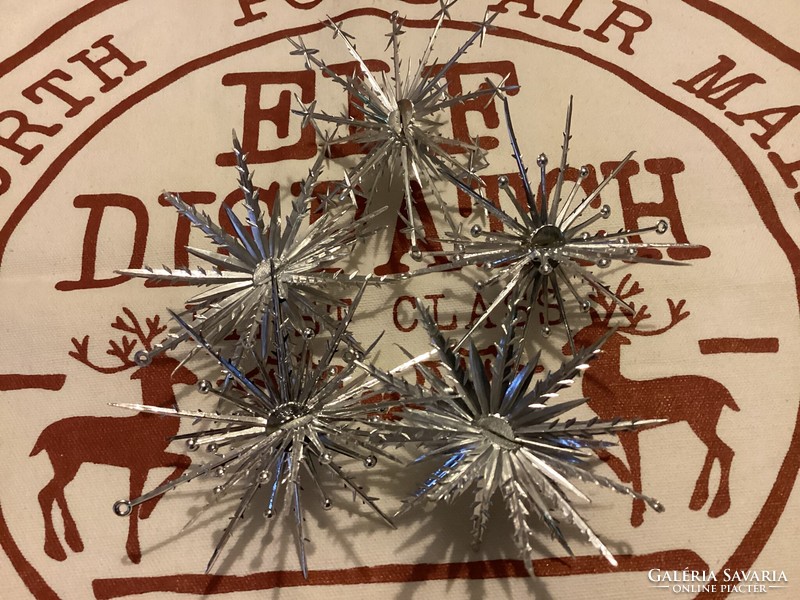 Plastic silver colored stars or snowflakes Christmas tree decorations