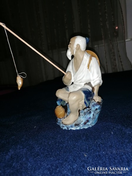 Chinese ceramic fisherman