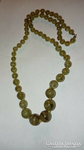 Vintage long art deco women's necklace, jewelry strung with green Murano-style glass beads