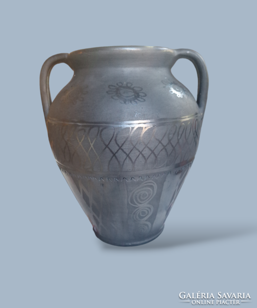 Ceramic vase with black handles