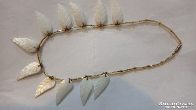 Old art deco style shell women's necklace, vintage jewelry strung with mother-of-pearl leaves