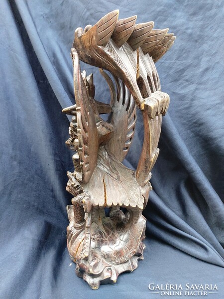 Balinese wood carving, bird of god Garuda-Vishnu from Hindu mythology.