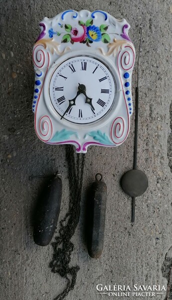 I discounted an antique porcelain wall clock, it works