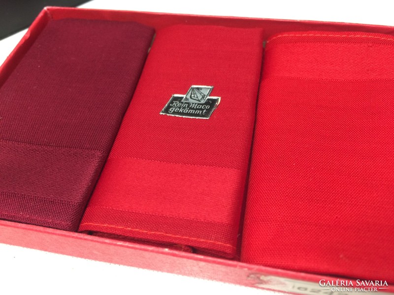 In its red handkerchief box