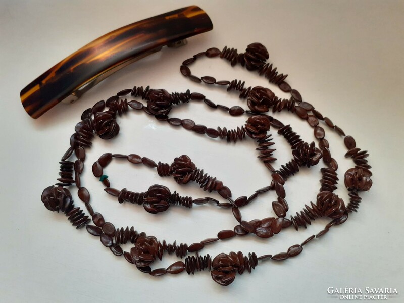 Old retro long necklace made of apple seeds in good condition