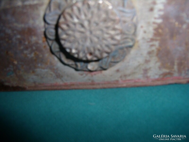 Iron case (from the first half of the 20th century), with a beautiful rosette cover