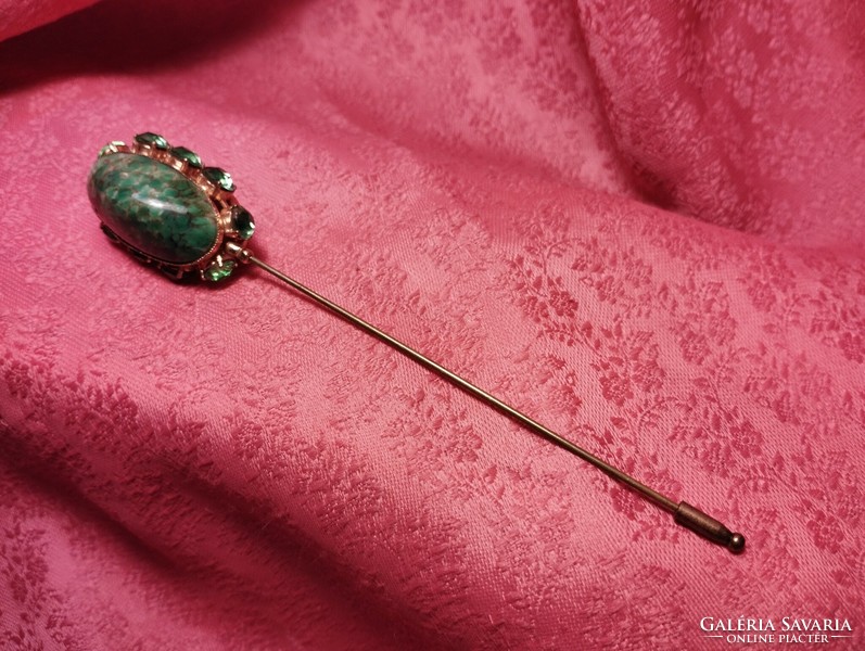 Interesting stick brooch pin with beautiful green stones