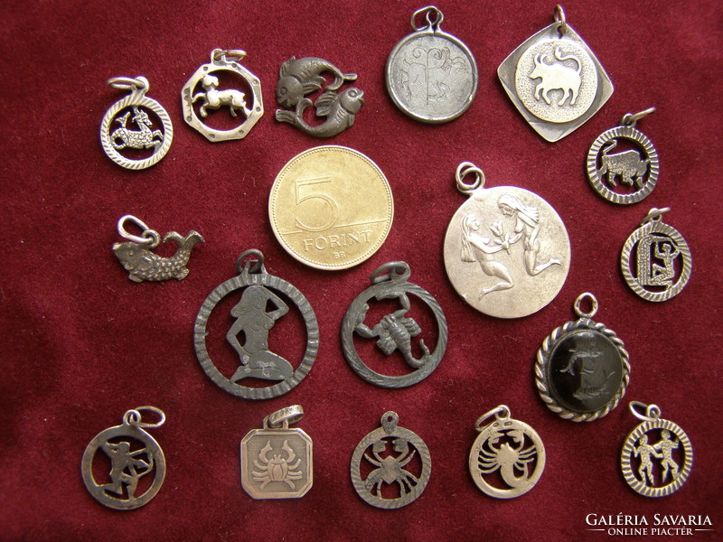 17 old, mainly Hungarian, silver horoscope pendants