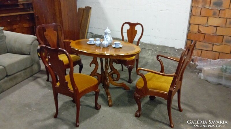 Extremely sophisticated salon table with four Queen Anne type Chippendale chairs