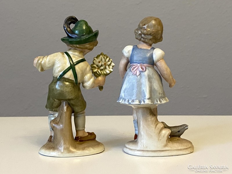 2 Defective painted Bertram porcelain statues boy and girl