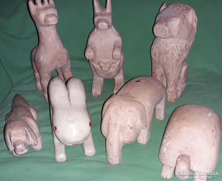 Antique hand-carved toy animals of one piece of wood, large sizes flawlessly together as shown in the pictures