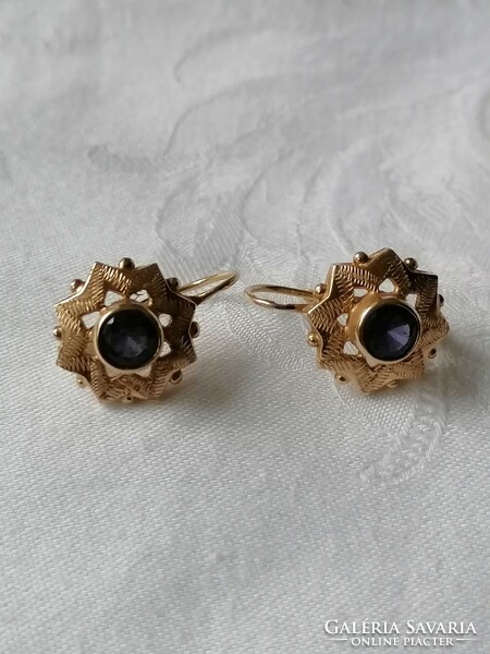 A pair of women's earrings with 14 carat amethyst stones