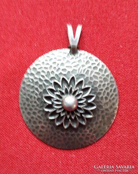 Bronze pendant, floral pattern, museum copy