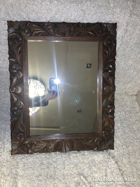 !!!Special offer today only!!!A showy brown carved wooden framed mirror in size 44x56 cm