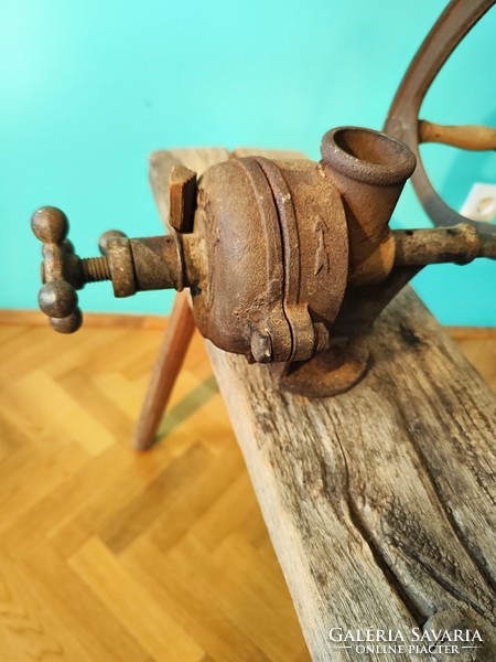 Antique corn grinder - old corn grinder