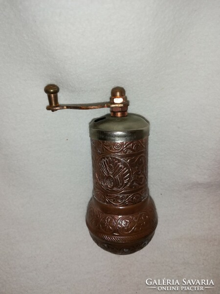 Bronze colored metal pepper grinder
